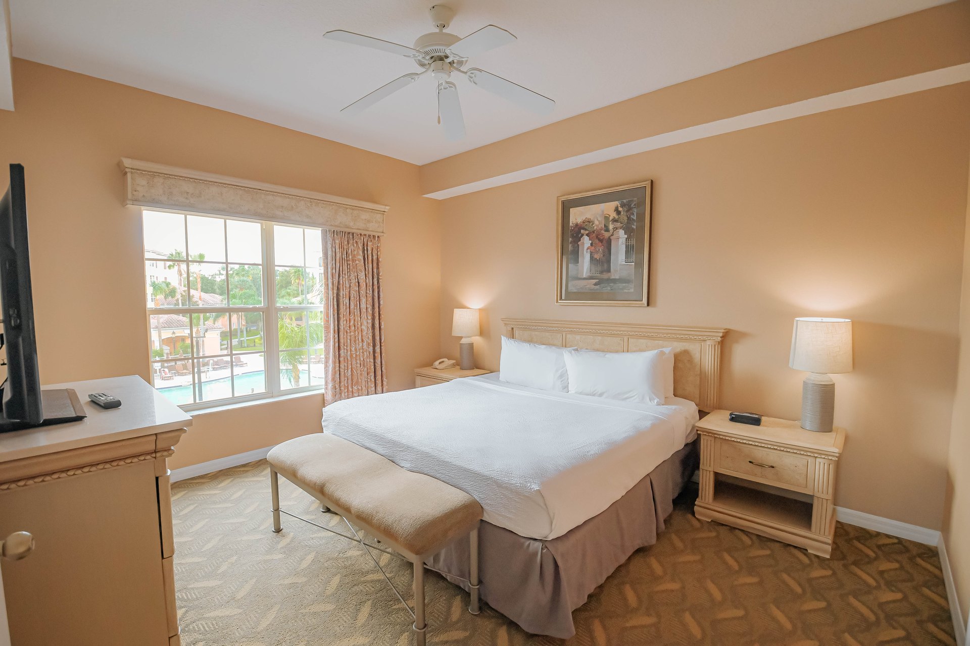Deluxe Suite master bedroom with a king bed